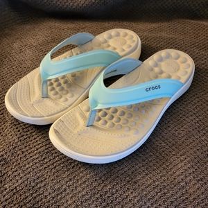 Crocs Reviva slip on, light blue, size 7